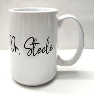 Heart with stethoscope and name of the doctor